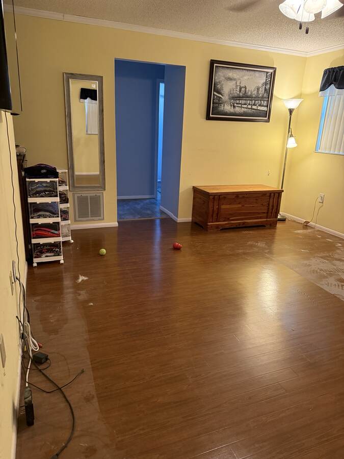 Old brown floor before Hudson Florida flooring work by AG Holmes Handyman Services