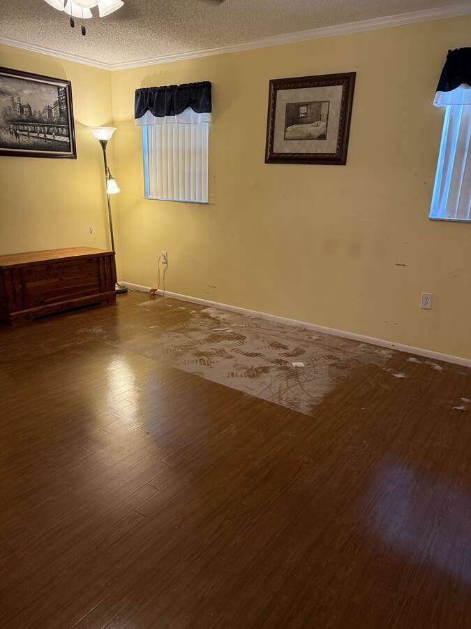 Old brown floor before flooring update in Hudson Florida